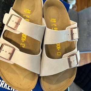 Light tan Brand new Birkenstock sandals. Never worn